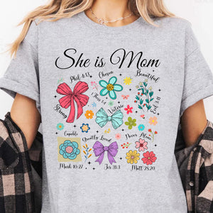 She Is Mom Sweatshirt – Faith-Based Christian Mother's Day Shirt With Bible Verses, Floral And Bow Coquette Design 682152