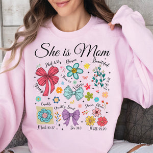 She Is Mom Sweatshirt – Faith-Based Christian Mother's Day Shirt With Bible Verses, Floral And Bow Coquette Design 682152