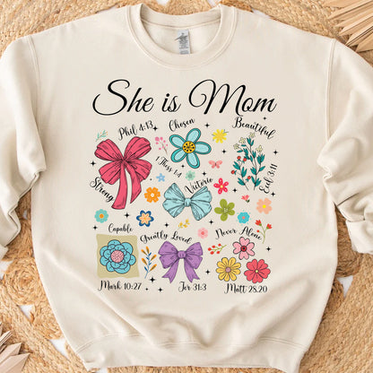 She Is Mom Sweatshirt – Faith-Based Christian Mother's Day Shirt With Bible Verses, Floral And Bow Coquette Design 682152