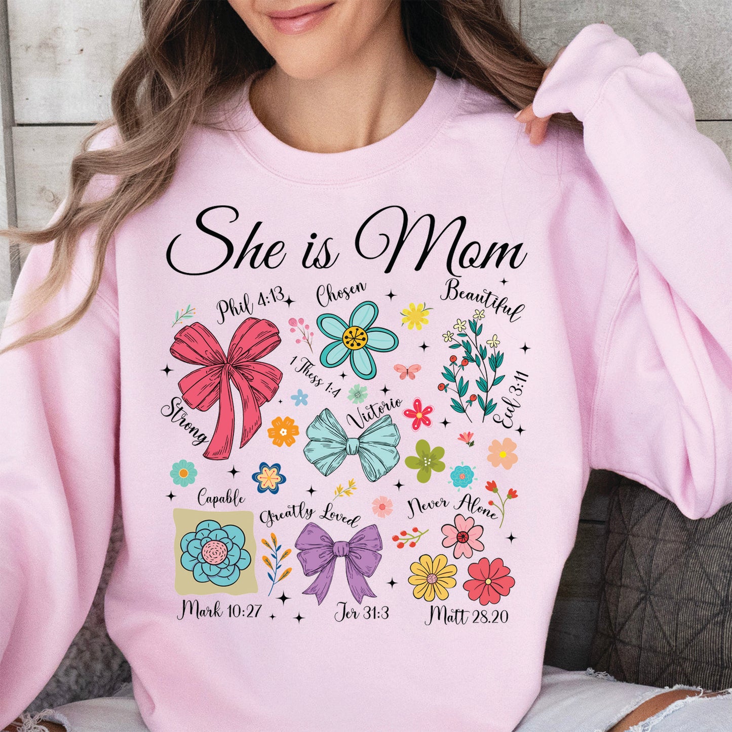 She Is Mom Sweatshirt – Faith-Based Christian Mother's Day Shirt With Bible Verses, Floral And Bow Coquette Design 682152