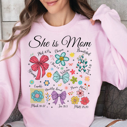 She Is Mom Sweatshirt – Faith-Based Christian Mother's Day Shirt With Bible Verses, Floral And Bow Coquette Design 682152